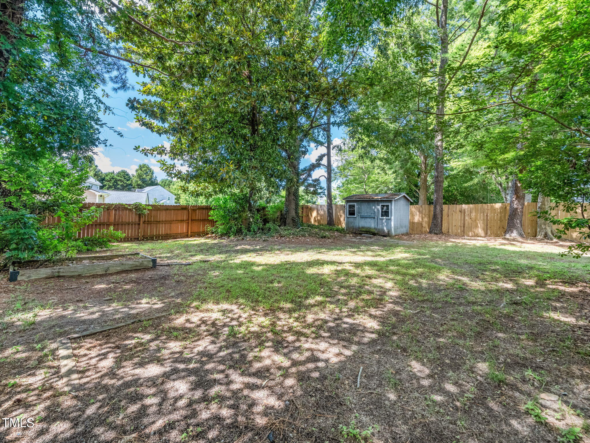 3909 Iron Horse Road Raleigh, NC 27616 - Photo 45 of 47 a front view of a house with a yard