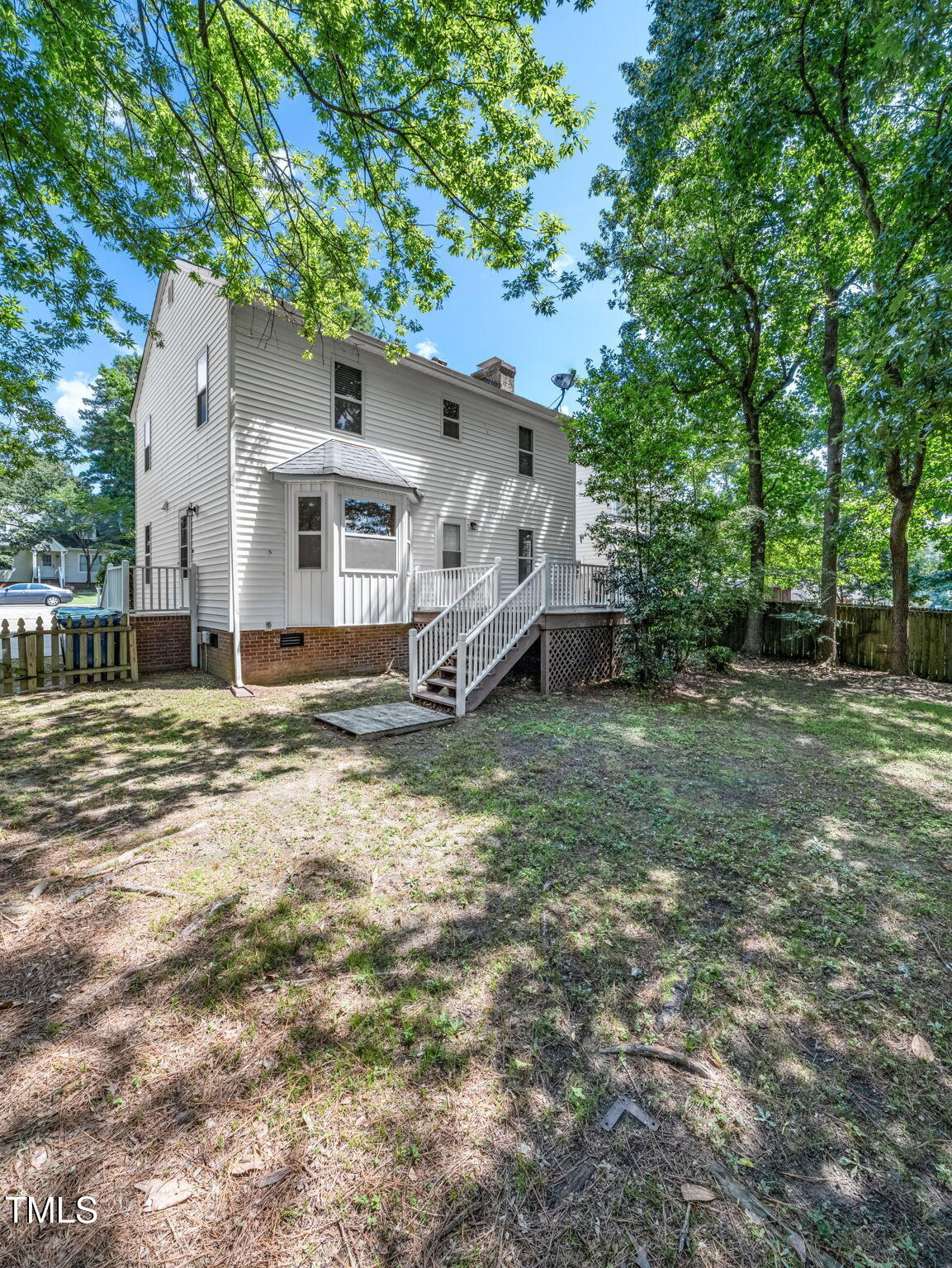 3909 Iron Horse Road Raleigh, NC 27616 - Photo 47 of 47 a front view of a house with a yard