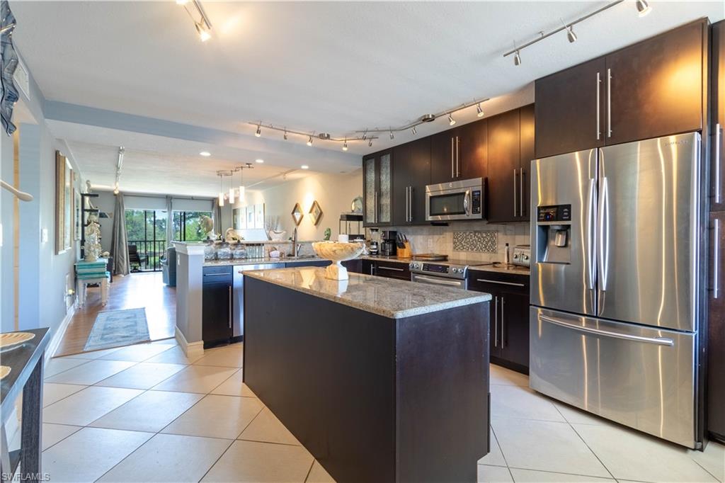 5535 Rattlesnake Hammock Road, Unit 205 Naples, FL 34113 - Photo 2 of 20