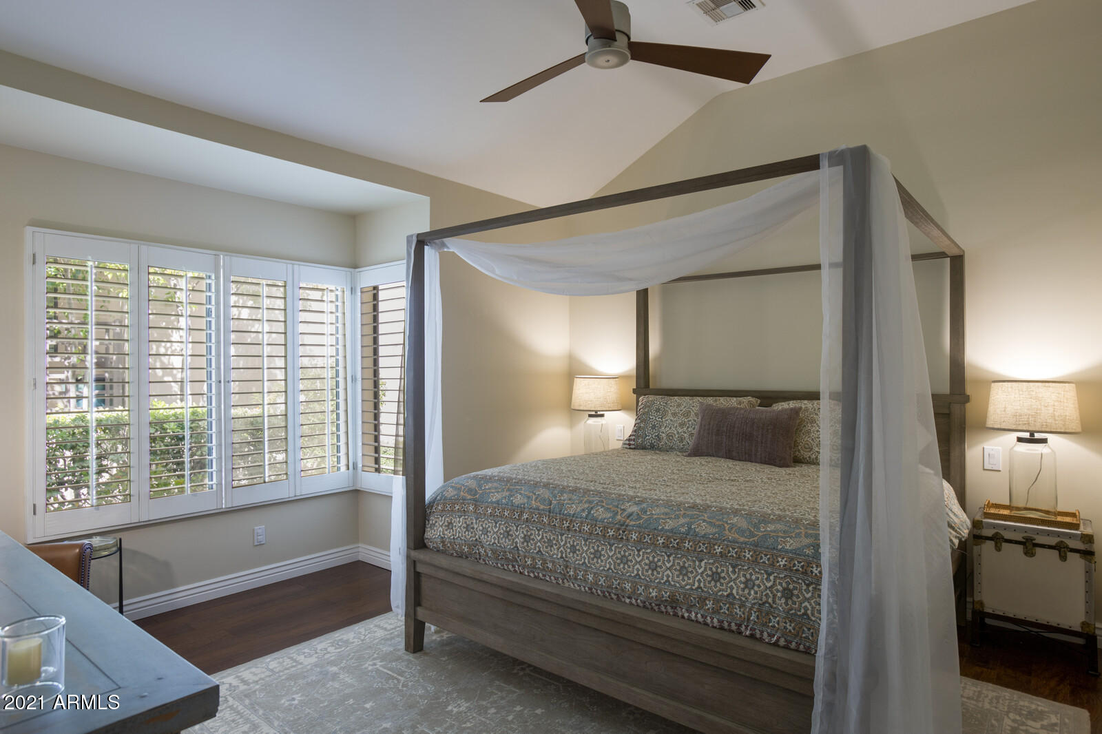 7272 East Gainey Ranch Road, Unit 85 Scottsdale, AZ 85258 - Photo 12 of 37 a bedroom with a large bed and a window