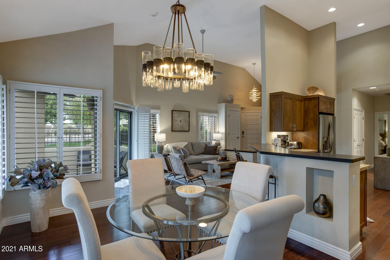 7272 East Gainey Ranch Road, Unit 85 Scottsdale, AZ 85258 - Photo 2 of 37 a view of a dining room with furniture window and outside view