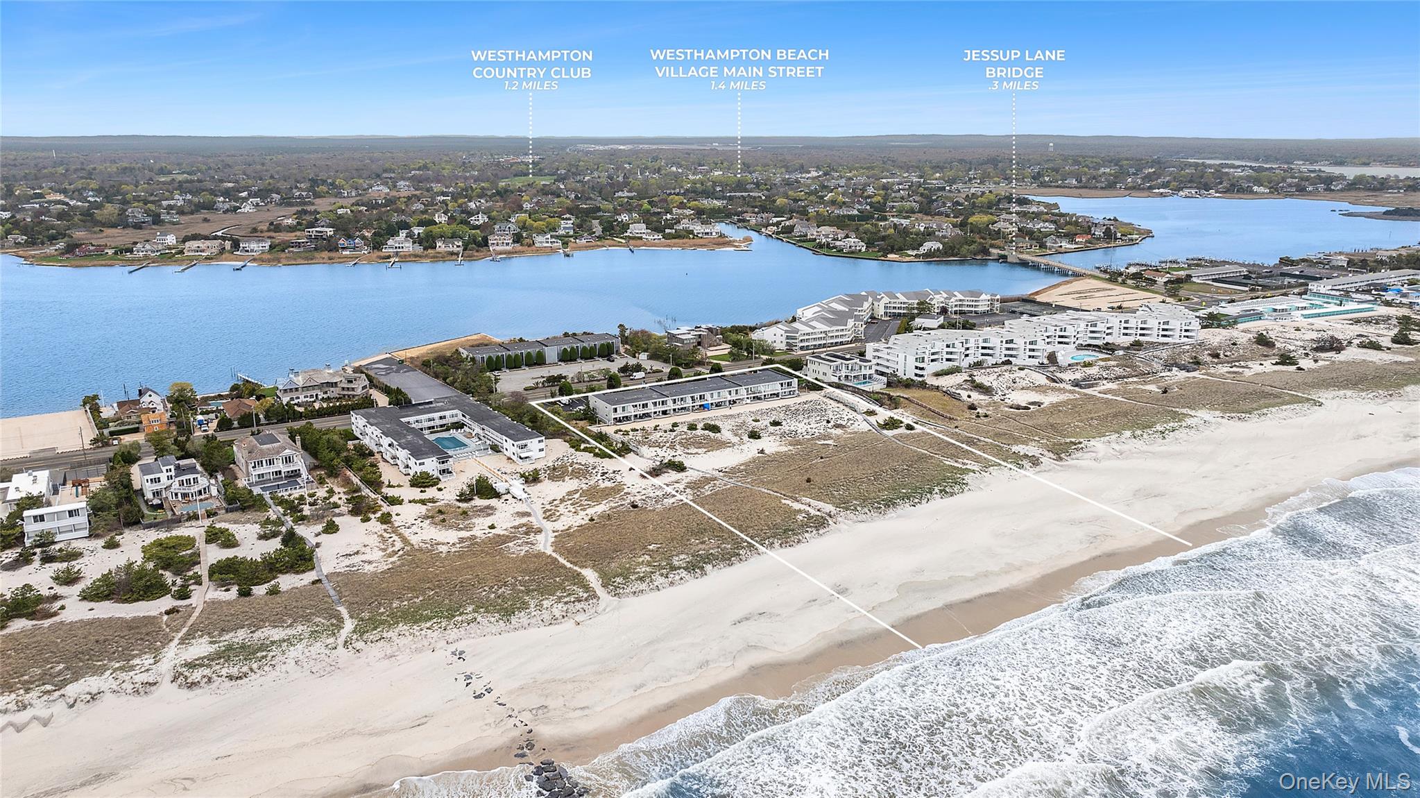 279 Dune Road, Unit 2 Westhampton Beach, NY 11978 - Photo 1 of 45 an aerial view of a building