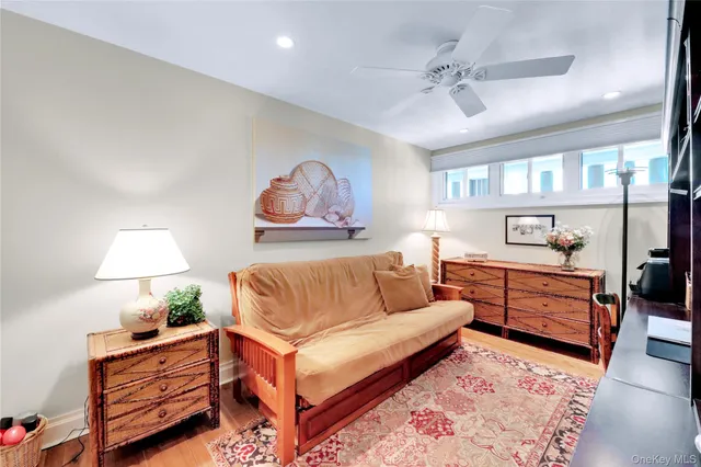 a bedroom with furniture and a dresser