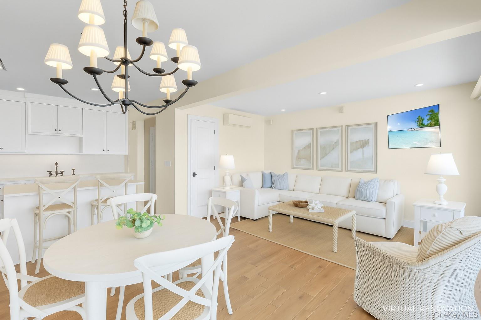 279 Dune Road, Unit 2 Westhampton Beach, NY 11978 - Photo 9 of 45 a living room with furniture chandelier and a chandelier