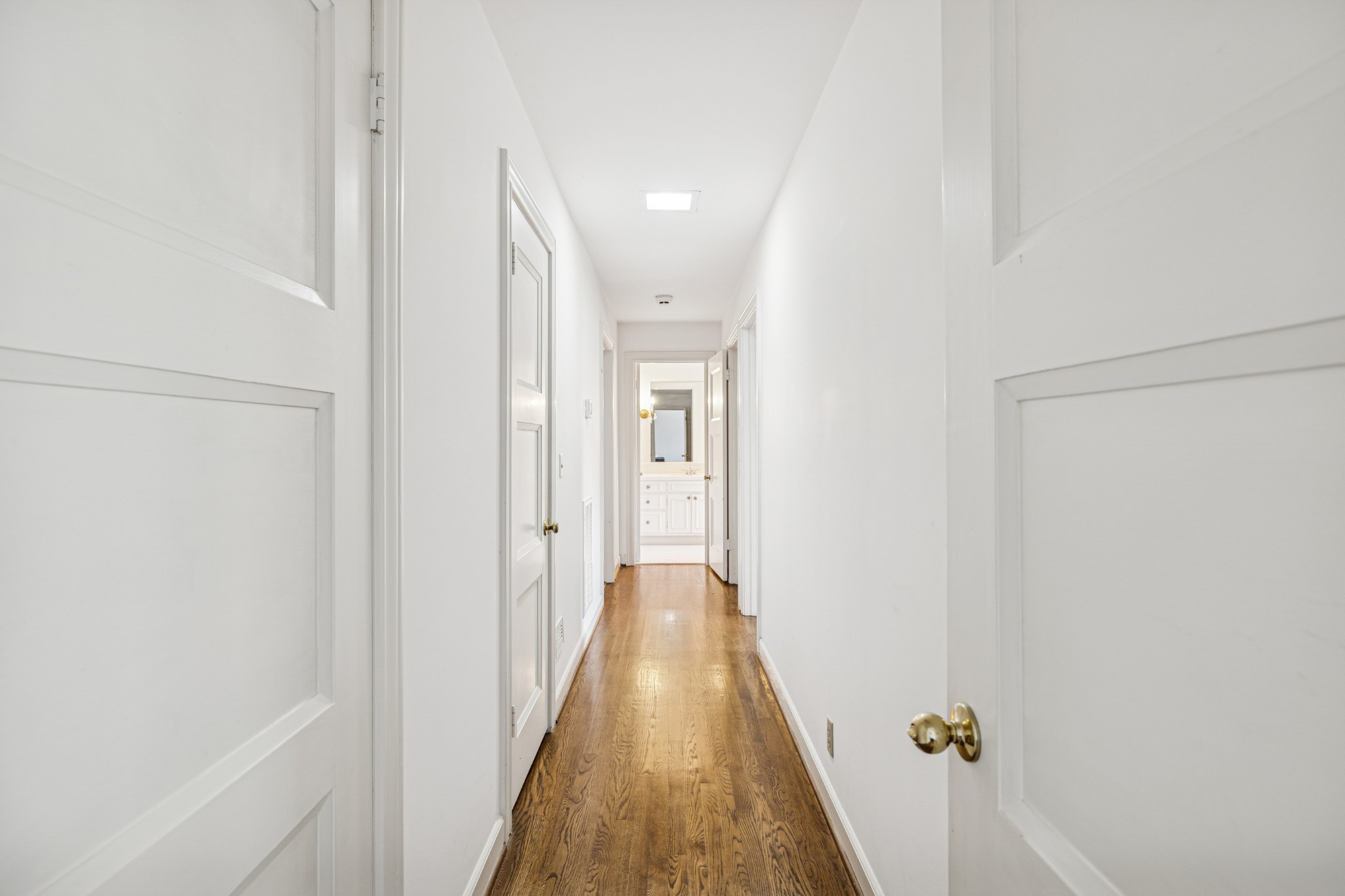 718 Murfreesboro Road Franklin, TN 37064 - Photo 22 of 35 a view of a hallway with wooden floor