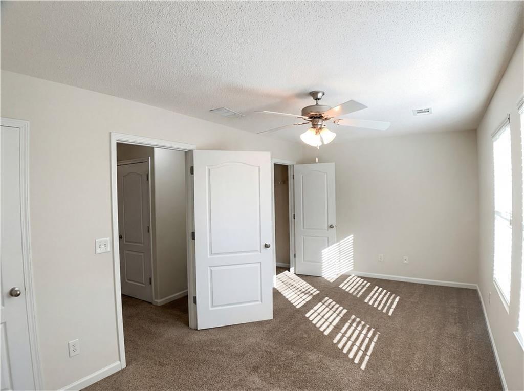 1428 Box Circle Winder, GA 30680 - Photo 11 of 21 wooden floor in an empty room with a window