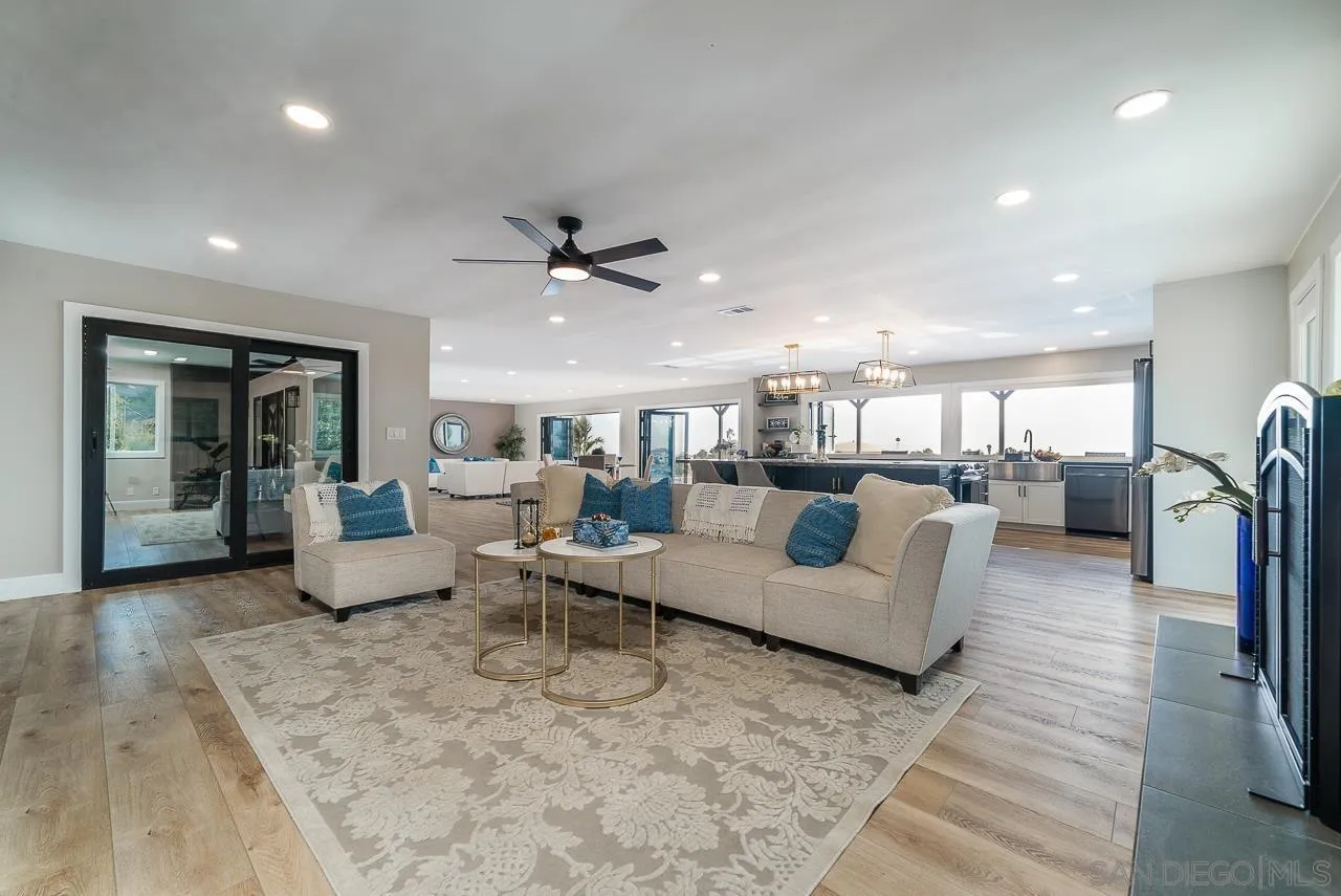 1647 Sleeping Indian Road Fallbrook, CA 92028 - Photo 17 of 48 a living room with furniture and a view of kitchen