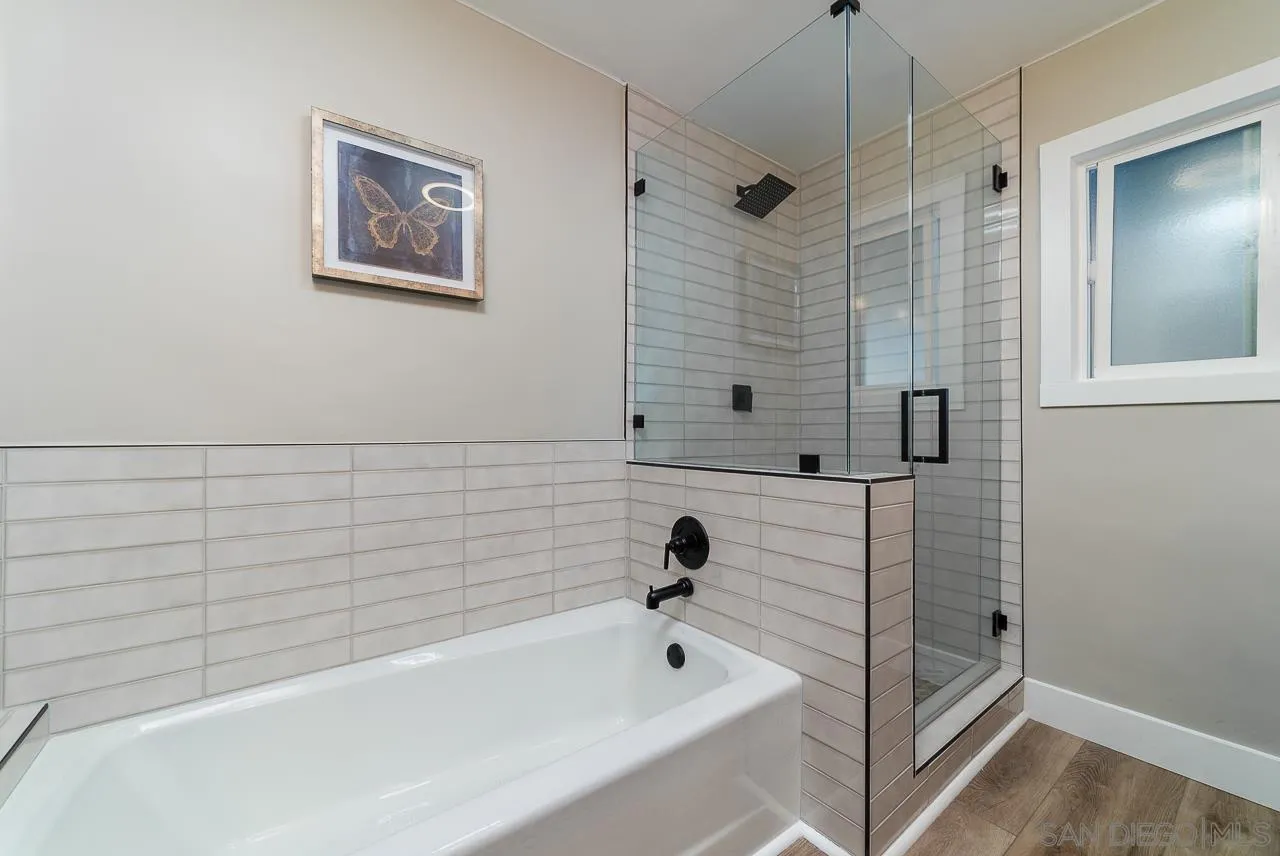 1647 Sleeping Indian Road Fallbrook, CA 92028 - Photo 29 of 48 a bathroom with a bathtub and a shower