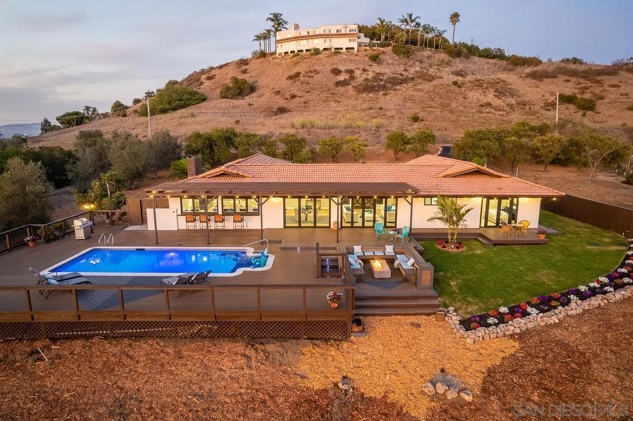 1647 Sleeping Indian Road Fallbrook, CA 92028 - Photo 4 of 48 a view of a house with a yard