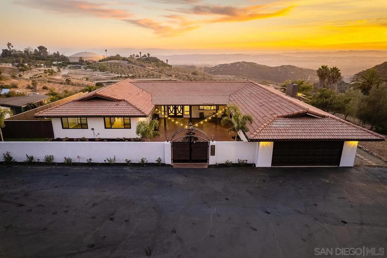 1647 Sleeping Indian Road Fallbrook, CA 92028 - Photo 43 of 48 a front view of a house with a yard