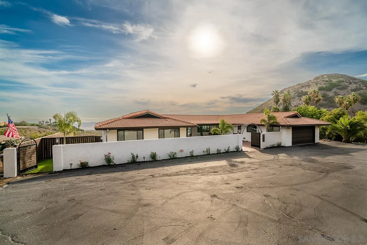 1647 Sleeping Indian Road Fallbrook, CA 92028 - Photo 48 of 48 a view of a house with a yard and potted plants
