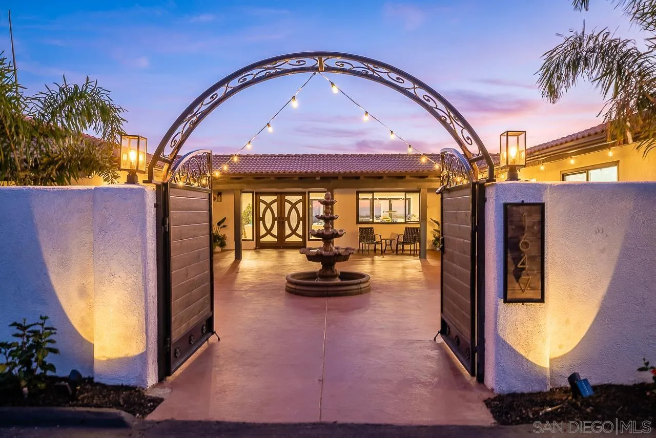 1647 Sleeping Indian Road Fallbrook, CA 92028 - Photo 5 of 48 a swimming pool with outdoor seating