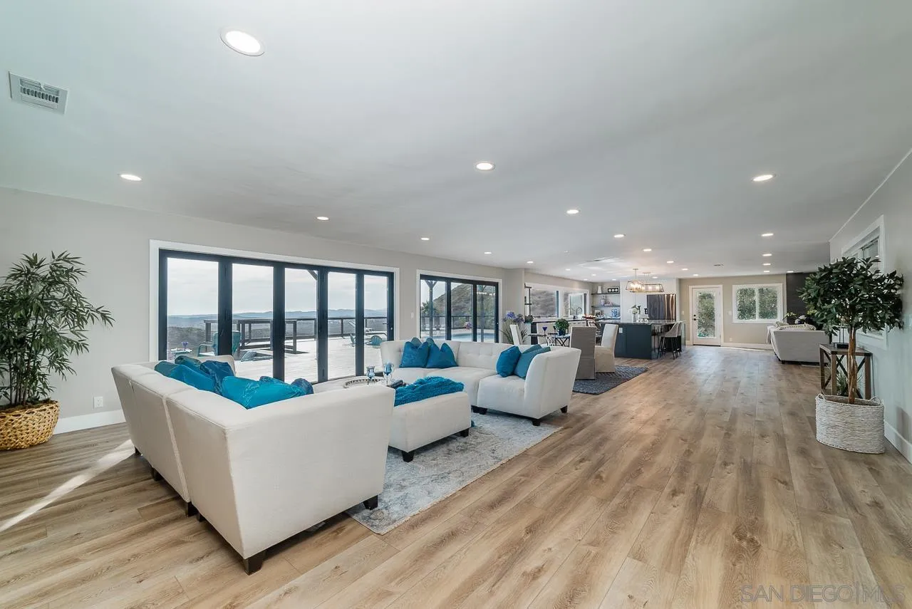 1647 Sleeping Indian Road Fallbrook, CA 92028 - Photo 7 of 48 a living room with furniture and a large window