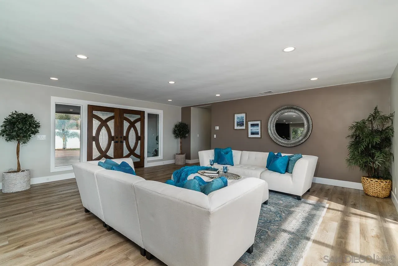1647 Sleeping Indian Road Fallbrook, CA 92028 - Photo 9 of 48 a living room with furniture and a large window