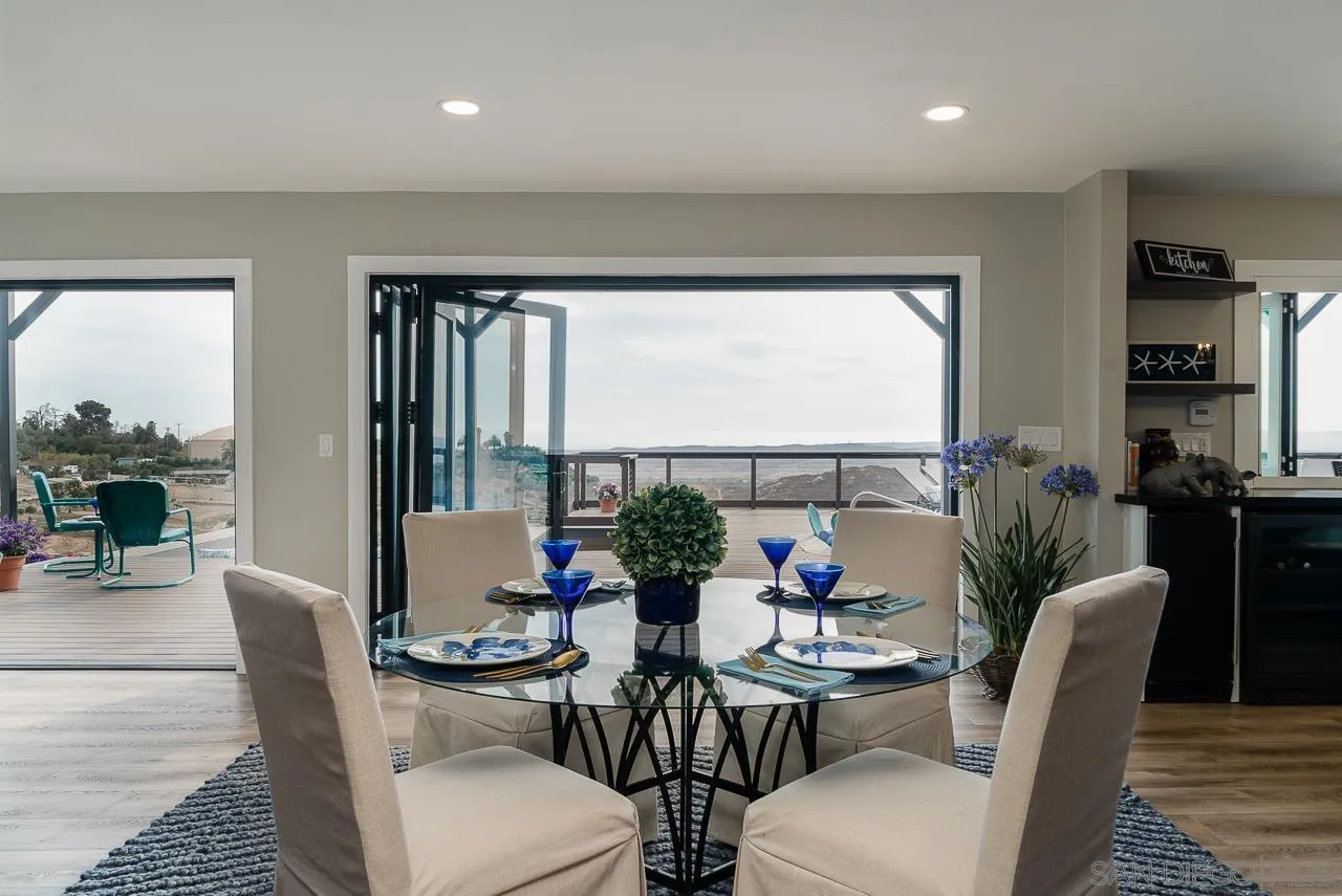 1647 Sleeping Indian Road Fallbrook, CA 92028 - Photo 10 of 48 a view of a dining room with furniture window and outside view