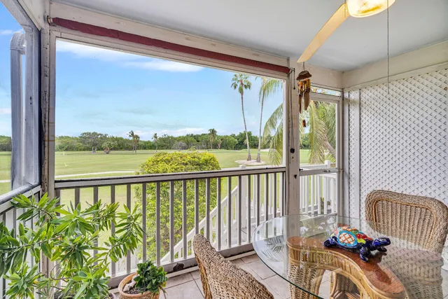 a view of a balcony with couch