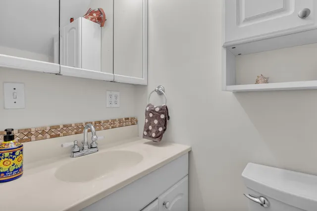 a bathroom with a sink and a toilet