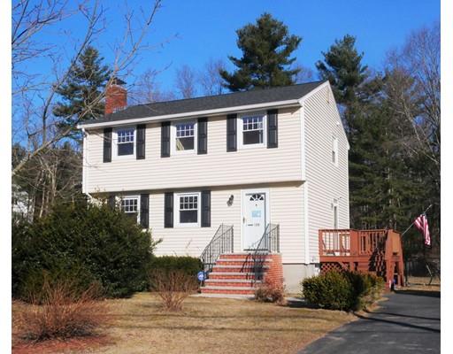 180 Mill Road Chelmsford, MA 01824 - Photo 1 of 30 a front view of a house with a yard