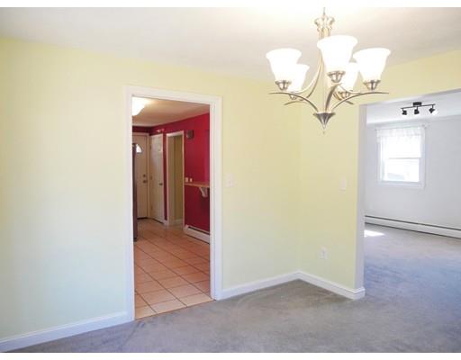 180 Mill Road Chelmsford, MA 01824 - Photo 11 of 30 a view of a room with a mirror and wooden floor
