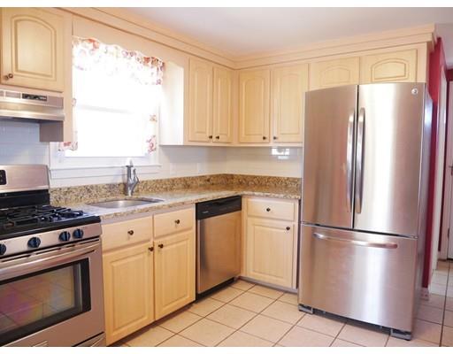180 Mill Road Chelmsford, MA 01824 - Photo 13 of 30 a kitchen with stainless steel appliances granite countertop a refrigerator sink and cabinets