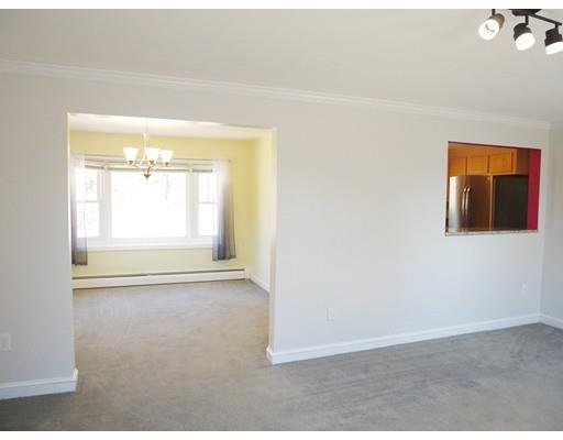 180 Mill Road Chelmsford, MA 01824 - Photo 4 of 30 an empty room with a window