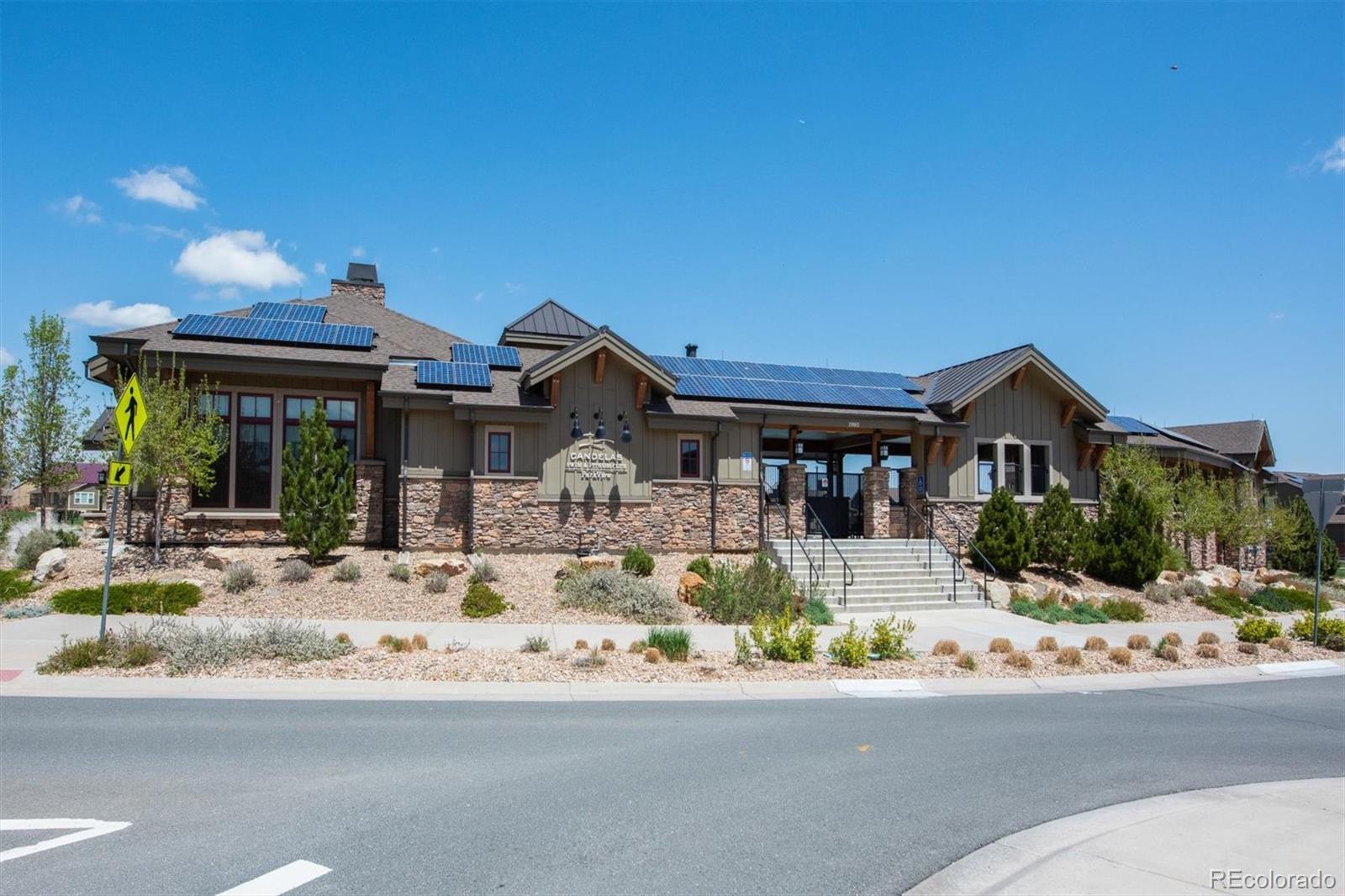 19955 West 93rd Avenue Arvada, CO 80007 - Photo 27 of 33 a front view of a house with a yard