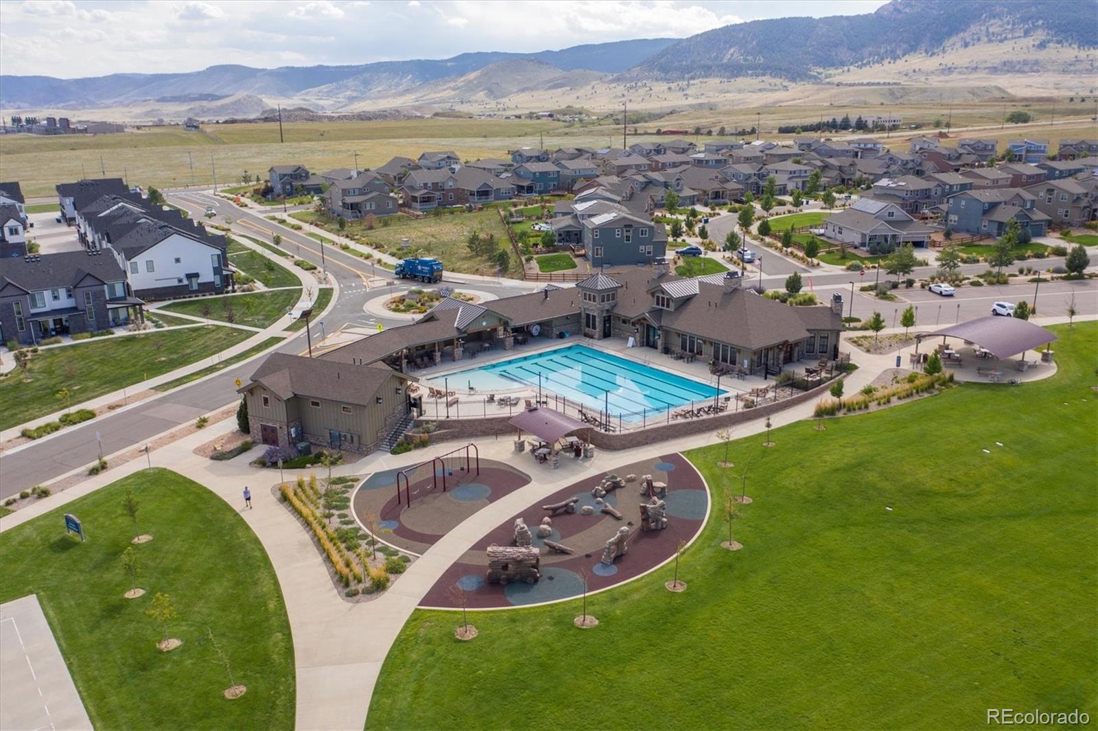 19955 West 93rd Avenue Arvada, CO 80007 - Photo 28 of 33 a view of a lake with a mountain