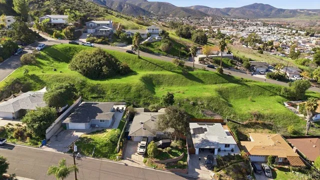 an aerial view of residential house with parking space