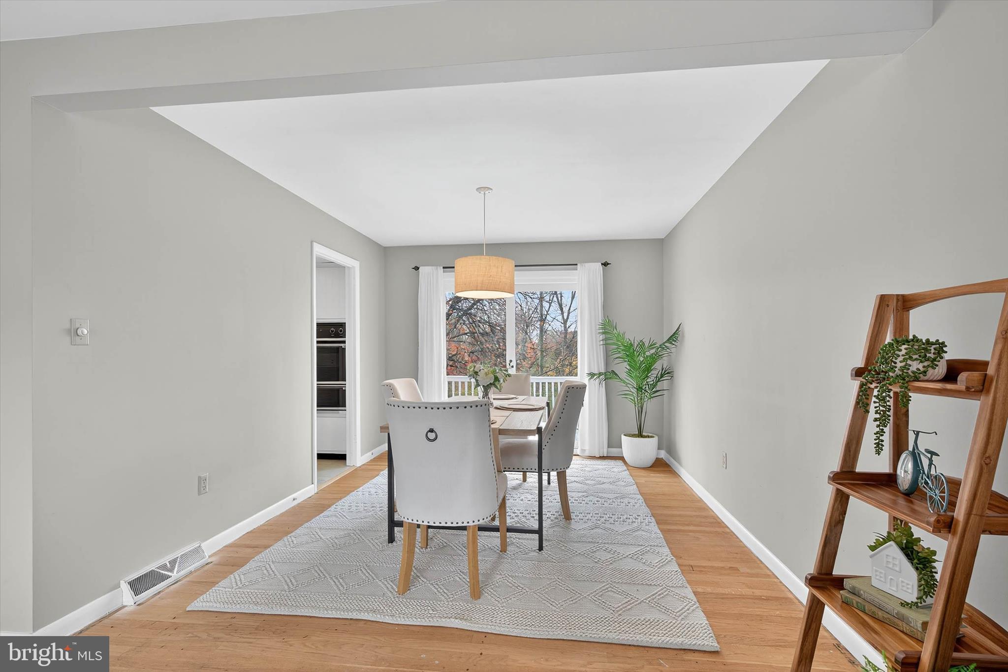 444 Biscayne Road Lancaster, PA 17601 - Photo 14 of 57 a dining room with furniture and wooden floor