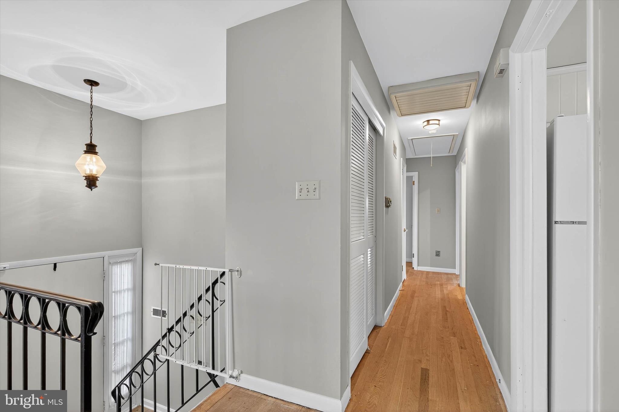 444 Biscayne Road Lancaster, PA 17601 - Photo 18 of 57 a view of a hallway with wooden floor and staircase