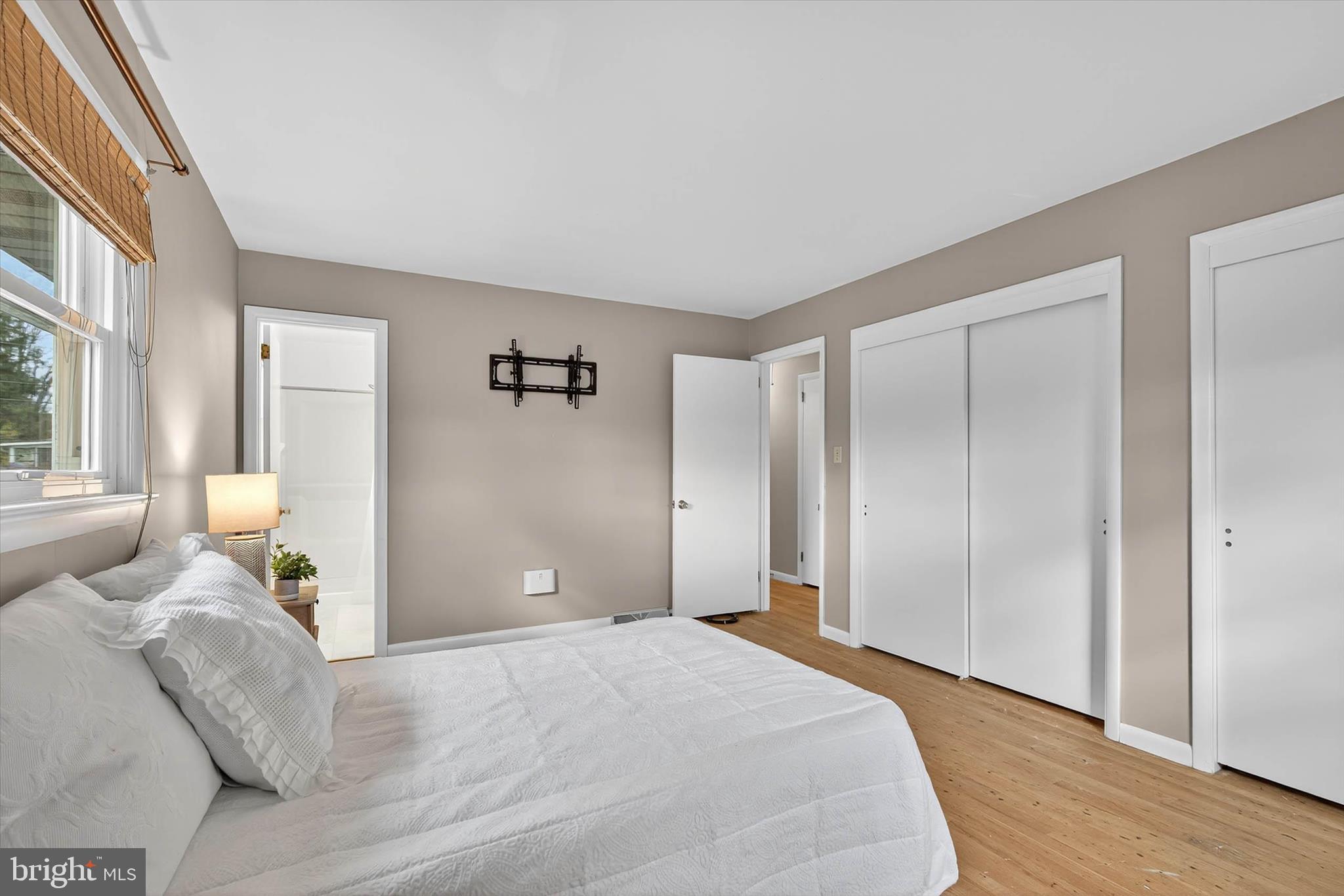 444 Biscayne Road Lancaster, PA 17601 - Photo 21 of 57 a bedroom with a bed and wooden floor