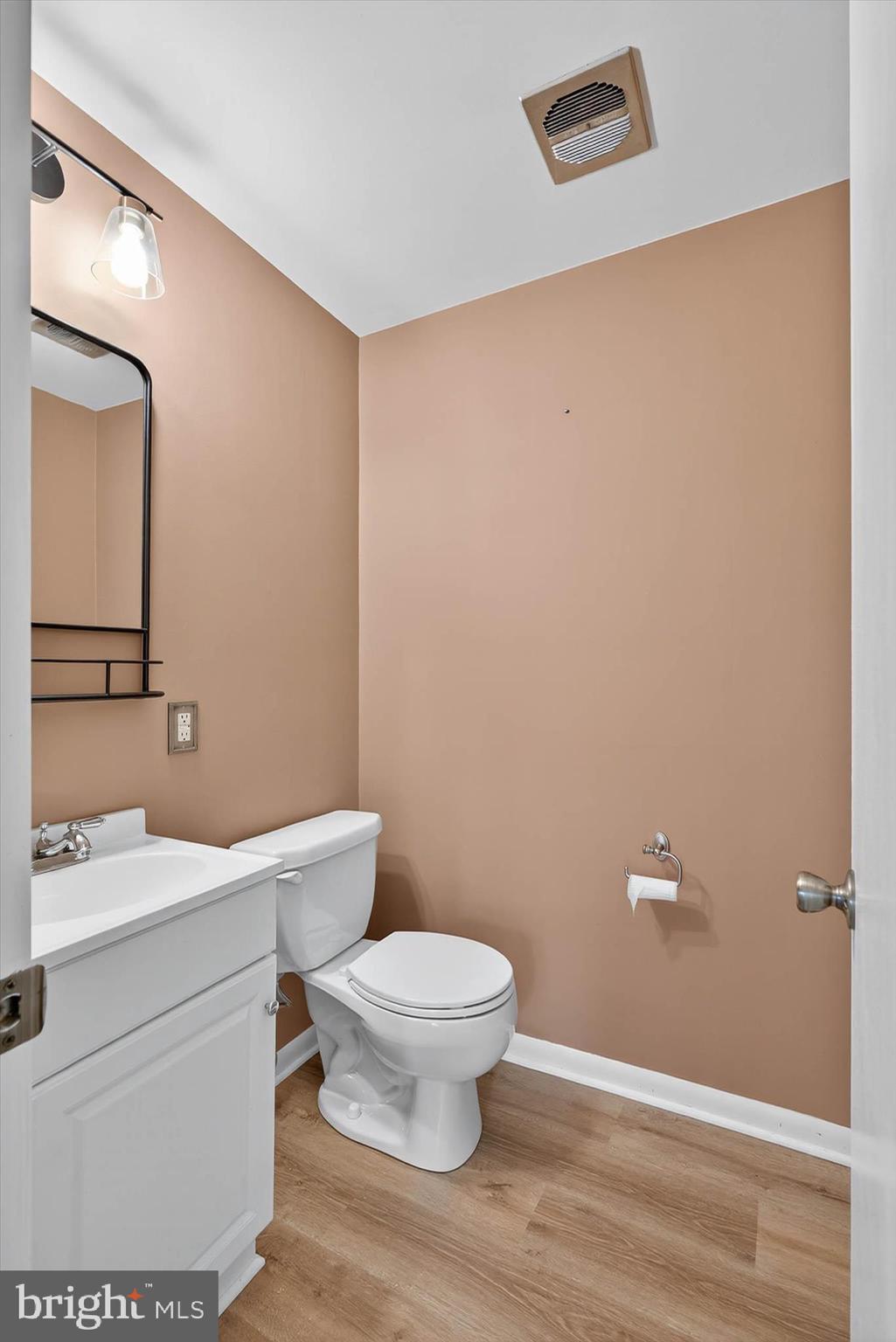 444 Biscayne Road Lancaster, PA 17601 - Photo 34 of 57 a bathroom with a toilet a sink and mirror