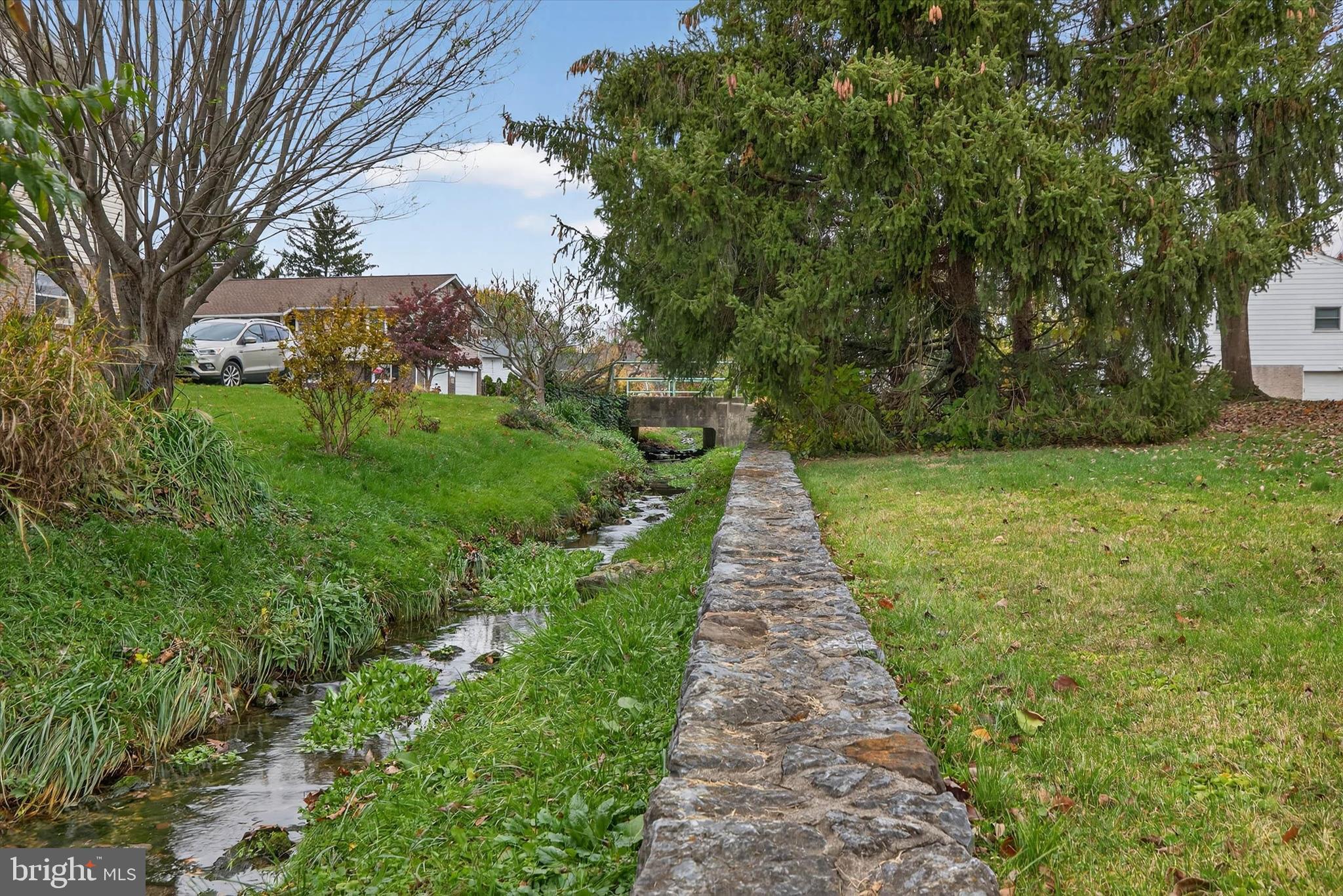 444 Biscayne Road Lancaster, PA 17601 - Photo 46 of 57 a view of a garden with wooden fence