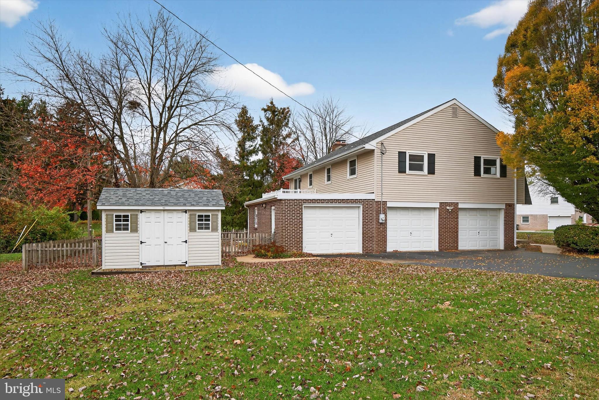 444 Biscayne Road Lancaster, PA 17601 - Photo 49 of 57 a white house that has a tree in front of it