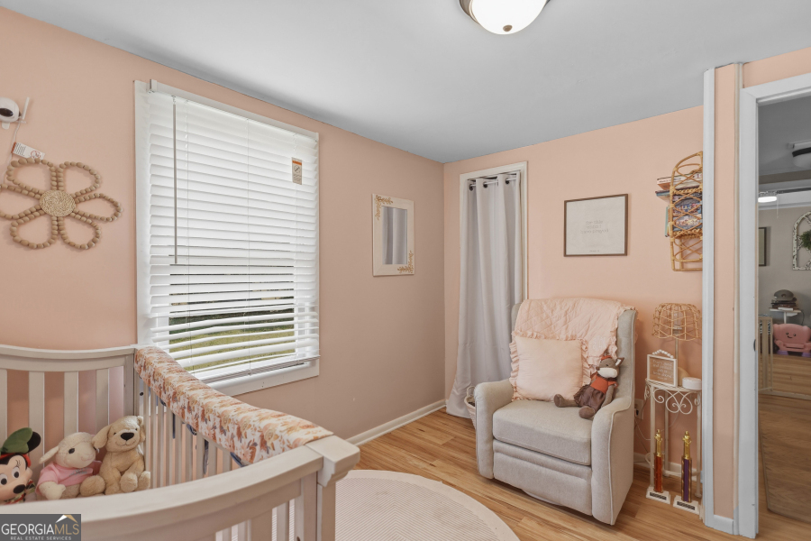 120 Carter Street Jesup, GA 31545 - Photo 17 of 27 a living room with furniture and a window