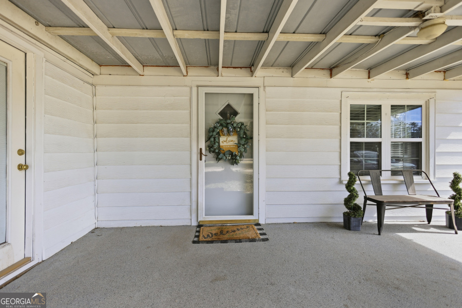 120 Carter Street Jesup, GA 31545 - Photo 2 of 27 a room with gym equipment