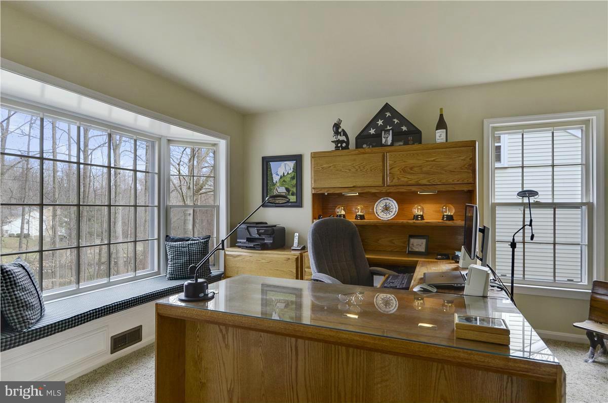 1317 Atwood Road Silver Spring, MD 20906 - Photo 22 of 30 a view of a workspace with furniture