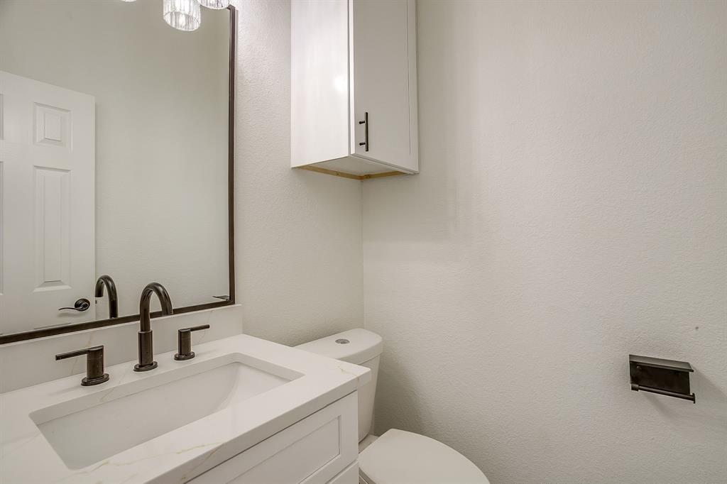 5102 Shadowood Road Colleyville, TX 76034 - Photo 26 of 40 Half Bath located downstairs.