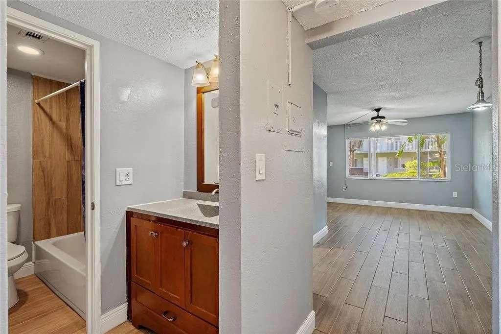 379 47th Avenue North, Unit 103 St. Petersburg, FL 33703 - Photo 18 of 24 a view of an entryway with wooden floor