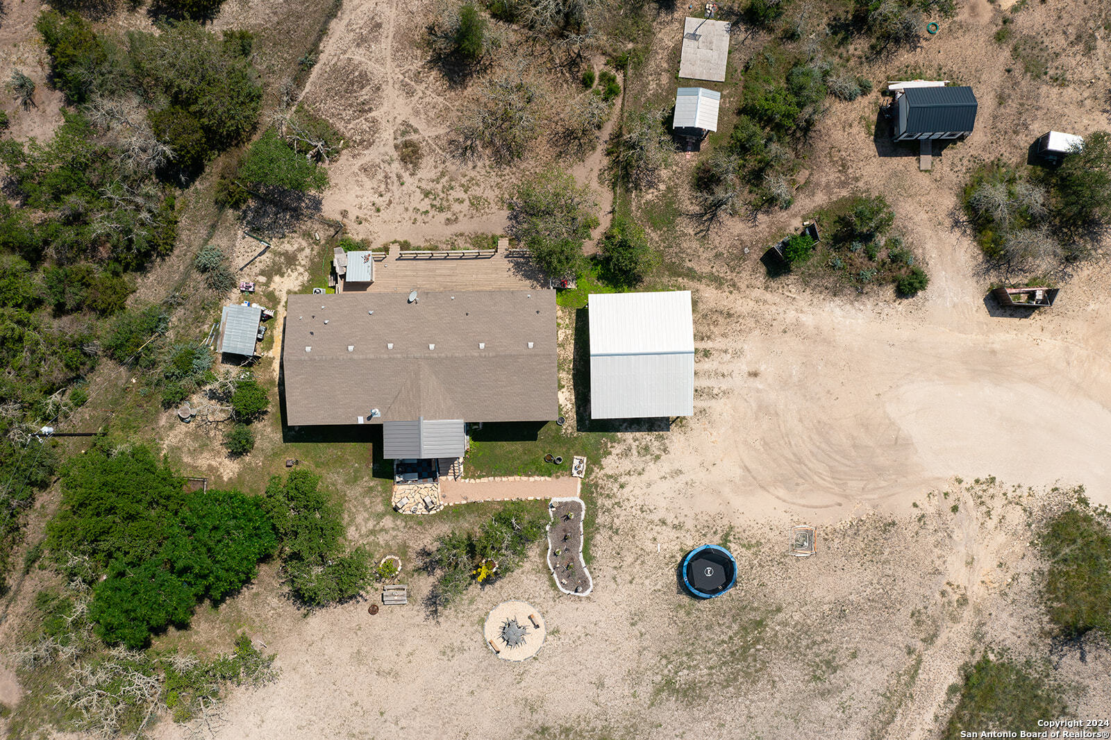 140 Twin Springs Road North Kerrville, TX 78028 - Photo 30 of 47 an aerial view of a house with outdoor space