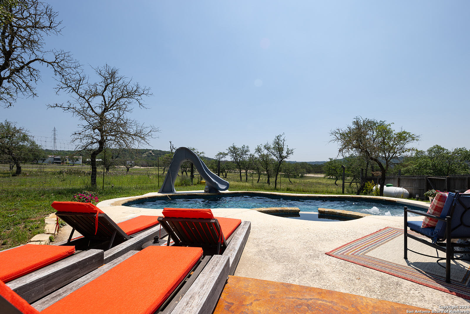 140 Twin Springs Road North Kerrville, TX 78028 - Photo 33 of 47 a view of a patio with swimming pool