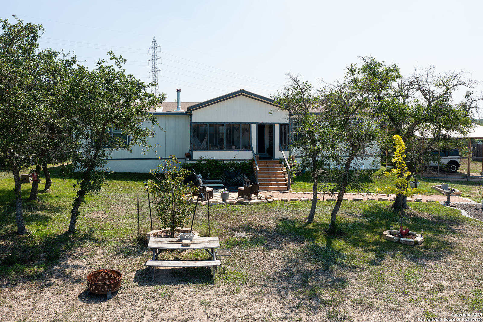 140 Twin Springs Road North Kerrville, TX 78028 - Photo 38 of 47 a front view of a house with a yard