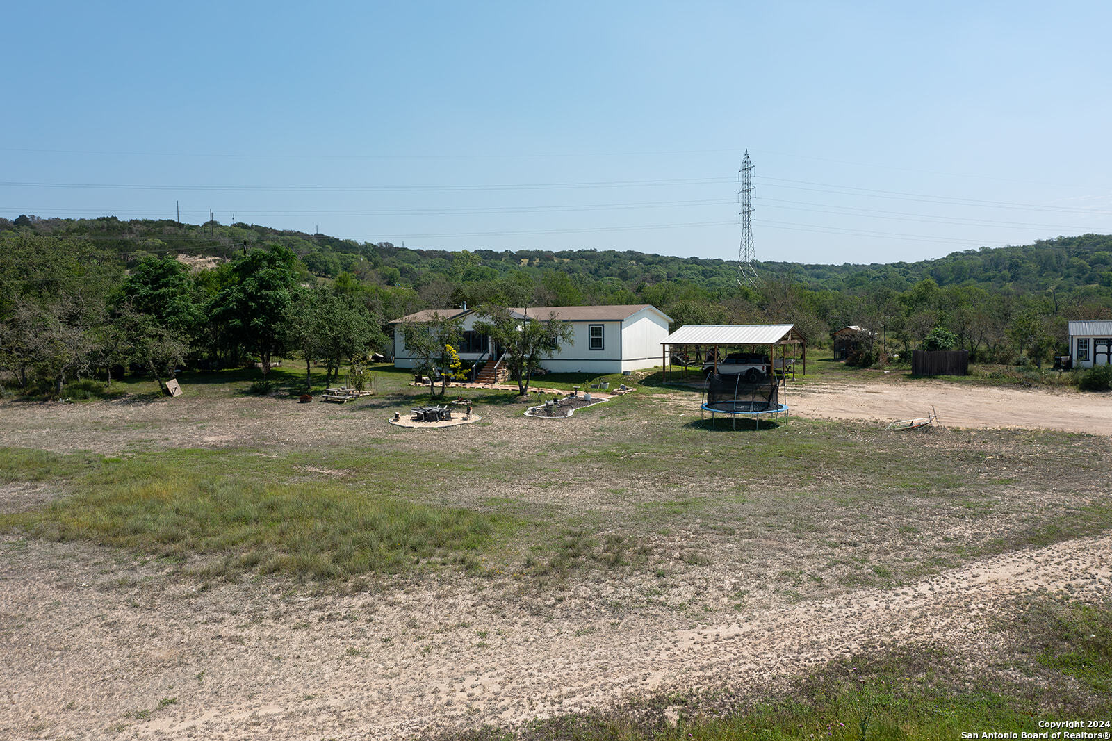 140 Twin Springs Road North Kerrville, TX 78028 - Photo 39 of 47 a view of outdoor space with seating area