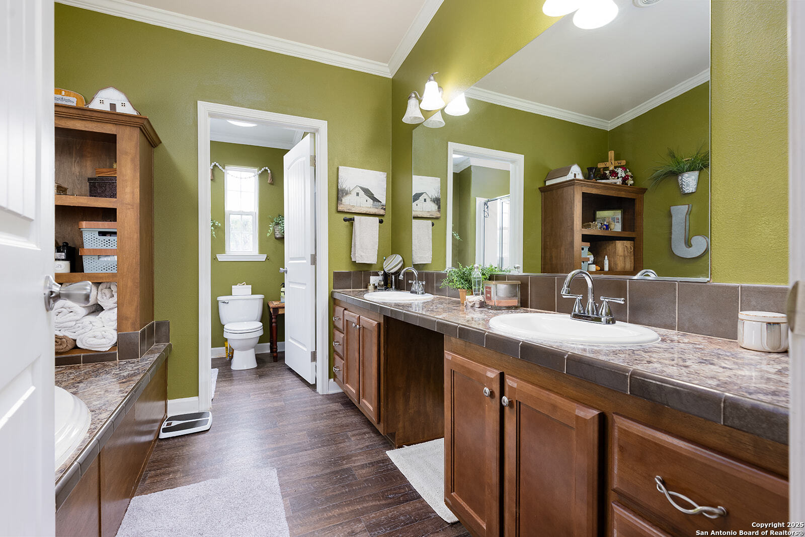 140 Twin Springs Road North Kerrville, TX 78028 - Photo 43 of 47 a spacious bathroom with a granite countertop sink a mirror and shower