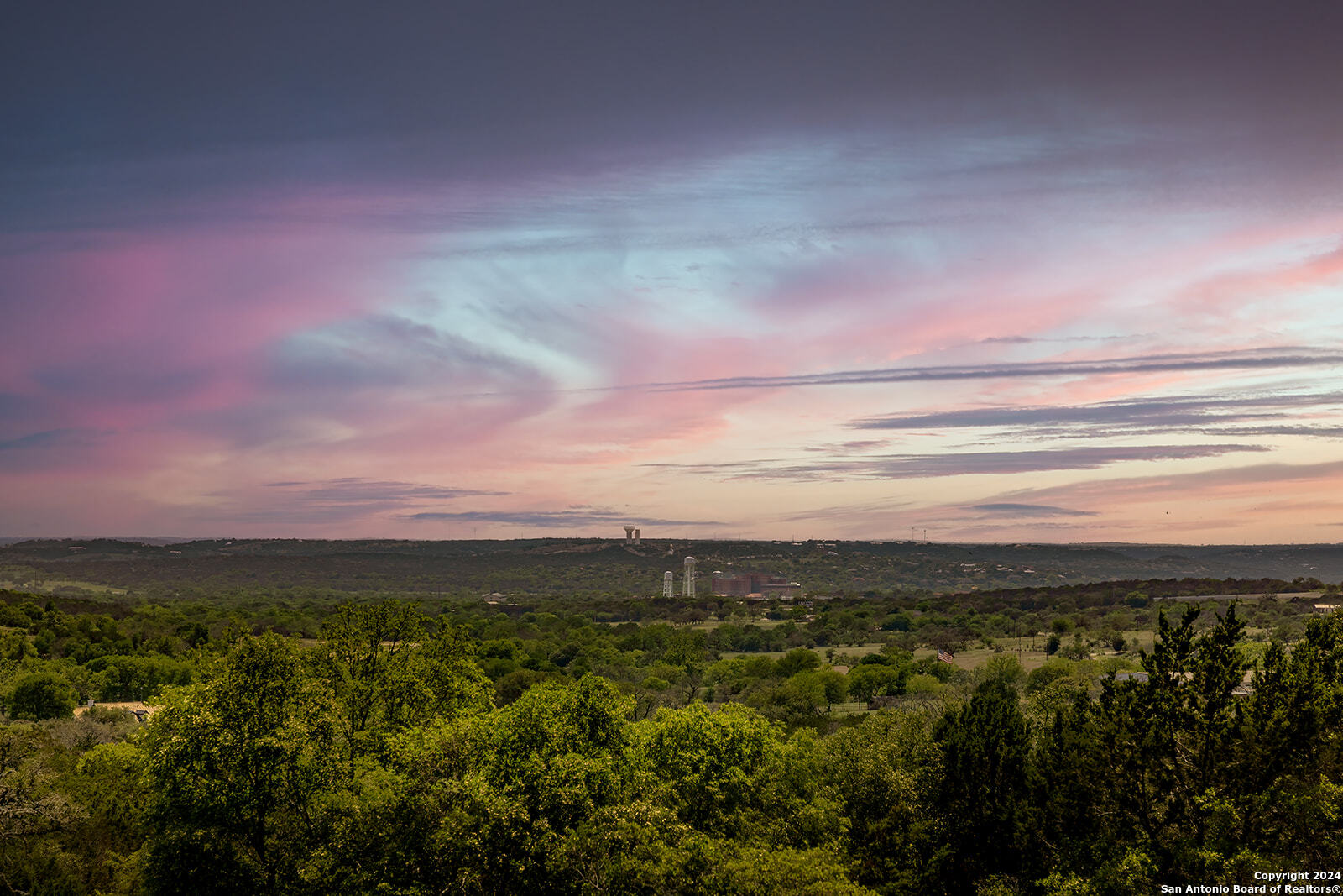 140 Twin Springs Road North Kerrville, TX 78028 - Photo 8 of 47 a view of a city with sunset