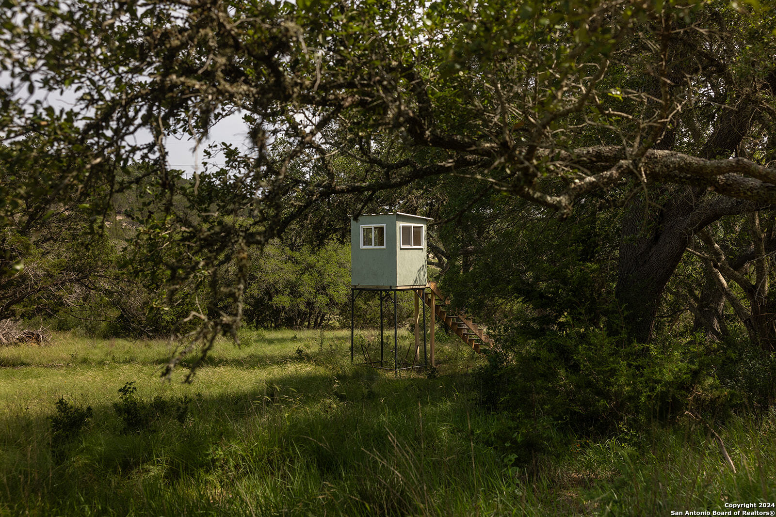140 Twin Springs Road North Kerrville, TX 78028 - Photo 9 of 47 a house view with a outdoor space
