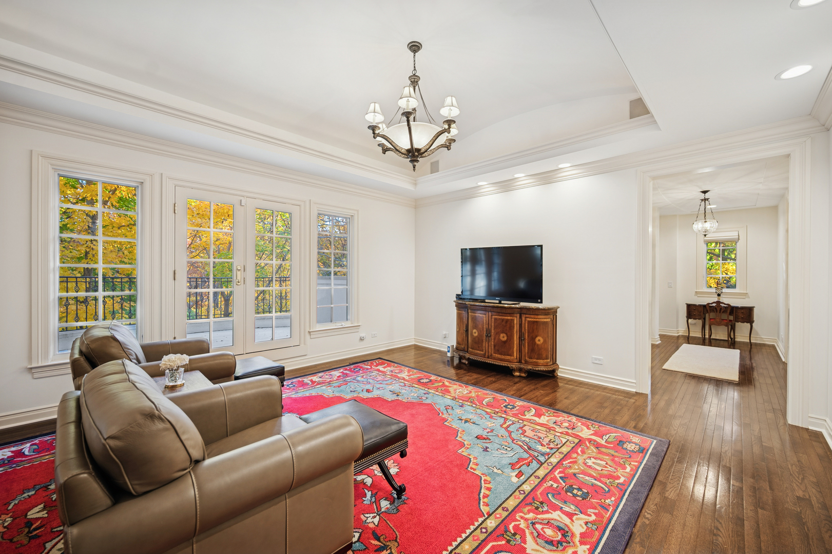 130 Maple Hill Road Glencoe, IL 60022 - Photo 21 of 47 a living room with furniture and a flat screen tv
