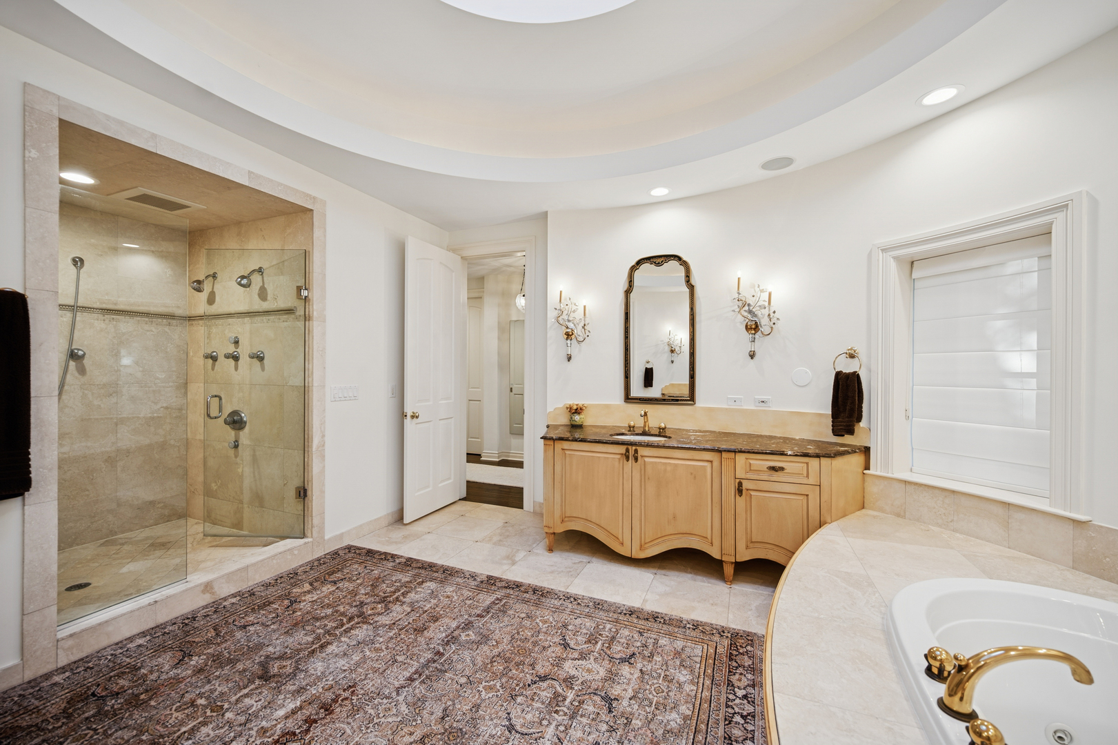 130 Maple Hill Road Glencoe, IL 60022 - Photo 22 of 47 a large bathroom with a double vanity sink a mirror and a shower