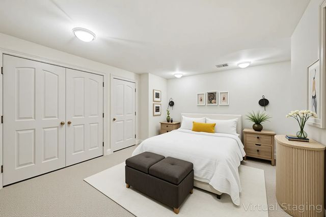 a bathroom with a granite countertop sink toilet a large mirror a bathtub and shower