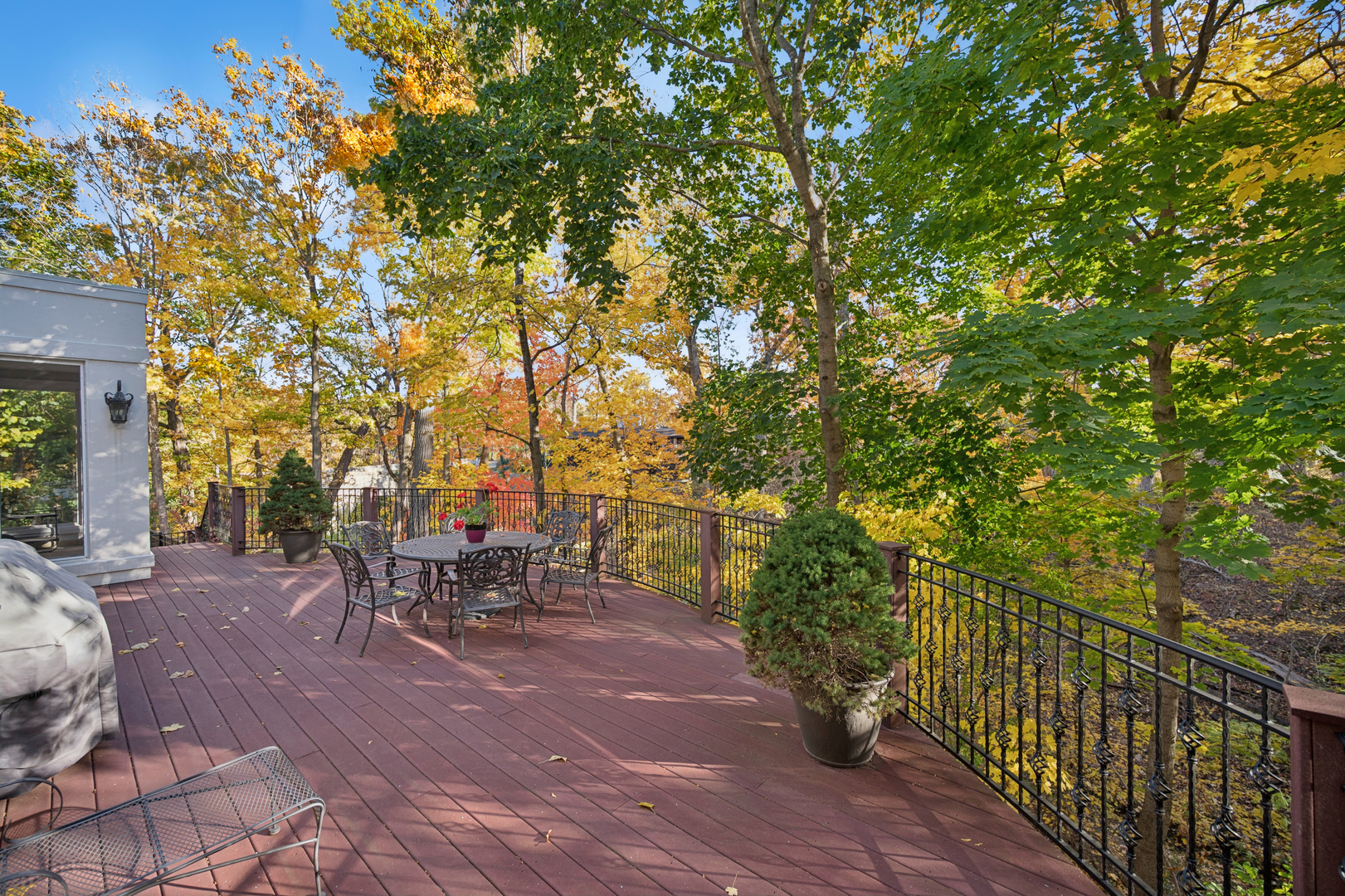 130 Maple Hill Road Glencoe, IL 60022 - Photo 42 of 47 a view of a patio with table and chairs and potted plants